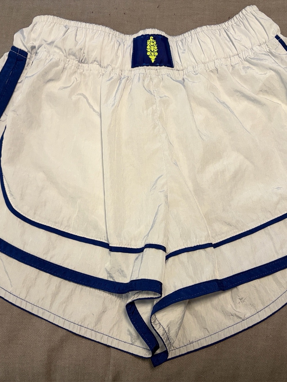 White Women’s' Athletic Shorts with Navy Trim